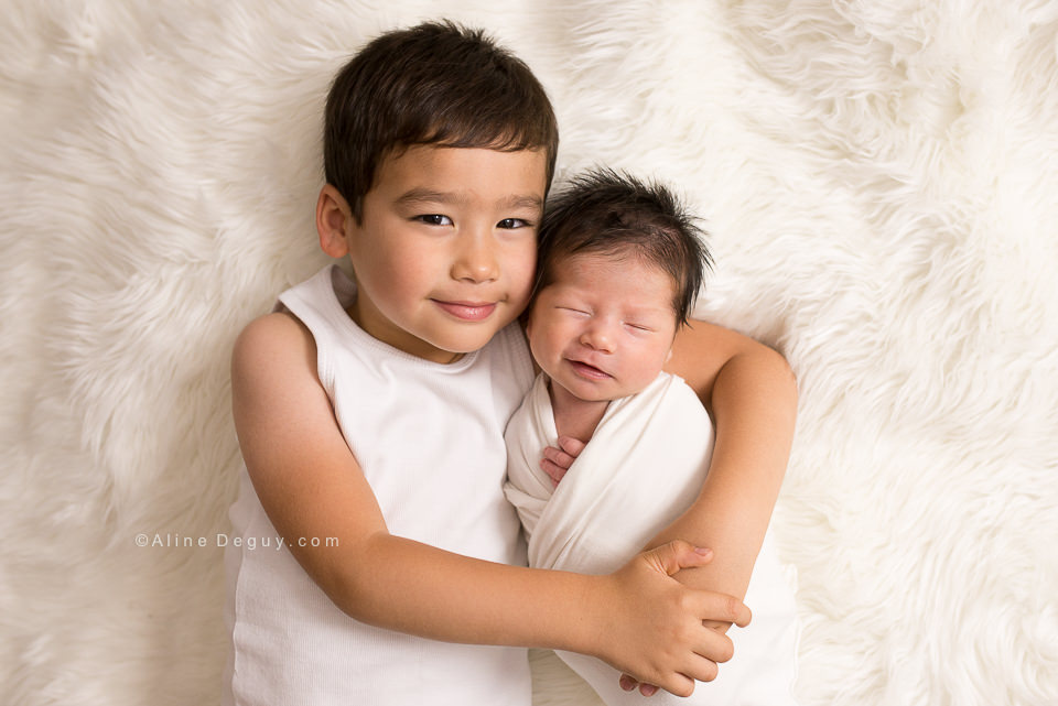 photographe famille bebe, photographe bebe qui sourit, photo bebe qui sourit, sourire, photographe famille paris, studio photo famille